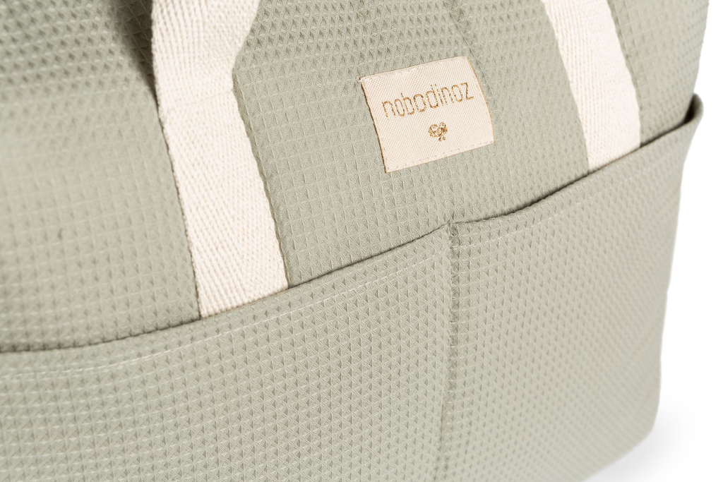 Gala-waterproof-changing-bag-laurel-green-nobodinoz-7-8435574919397.webp